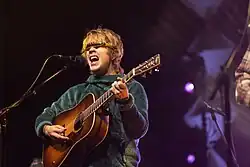 Billy Strings in 2021 with his signature Preston Thompson dreadnought guitar