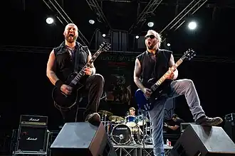 Luke Appleton, Martin McNee and Chris Appleton performing with Blaze Bayley in 2024