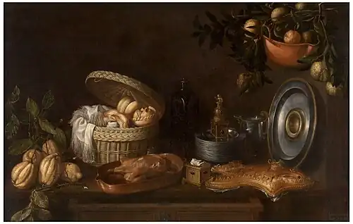 Baked food, metallic kitchenware, and fruits on branches. Still Life by Tomás Yepes; 1668, 102 × 157 cm, Prado Museum.