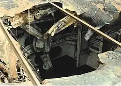 Close up of the damage sustained by Reeves from a 500-pound bomb. (1989)