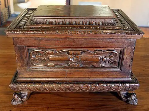 Renaissance cartouche on a chest, 16th century, walnut, Palazzo Davanzati, Florence, Italy