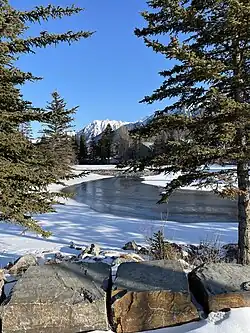 Bow River from bridge in Canmore village, Alberta, March 2023