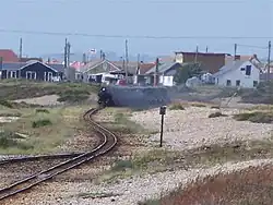 A train approaching the junction from New Romney