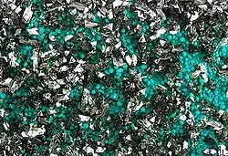 Brochantite (emerald green) and chrysocolla, from the Rokana Mine, Zambian Copperbelt