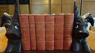 A pair of hand-carved bookends depicting two dogs (around 1910)