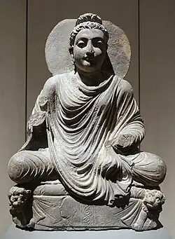 The Buddha on lion throne. Takht-i-Bahi. Schist, H. 525 mm (20.7 in). Museum für Indische Kunst.