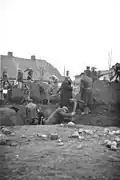 Jews build air-raid trenches under the supervision of RAD, Uniejów, May 1941
