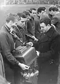 The team of SC Karl-Marx-Stadt receives their trophy as the new East German champion before the first final on 6 December 1959.
