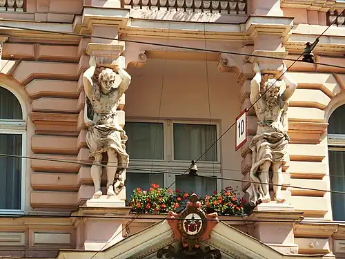 Atlantes on main facade, 1st floor balcony