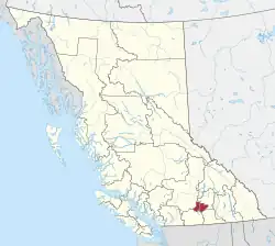 A map of British Columbia depicting its 29 regional districts and equivalent municipalities. One is highlighted in red.