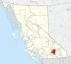 A map of British Columbia depicting its 29 regional districts and equivalent municipalities. One is highlighted in red.