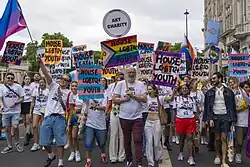 CEO Adam Pemberton Wickham (Centre) Marches with akt staff, volunteers and partners at London Pride 2025