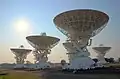 A compact arrangement of dishes, at the north spur junction.