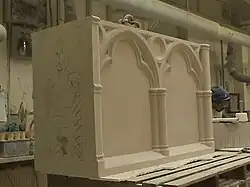 A split-pin lewis placed in the top of an altar stone