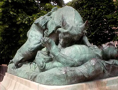 Rhinoceros Attacked by Two Tigers by Auguste Caïn. Bronze, (1882)