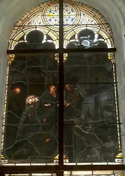 Stained glass window with the removal of the body.