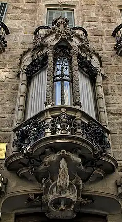 Stylized Art Nouveau mascaron of Casa Calvet (Carrer de Casp no. 48), Barcelona, Spain, designed by Antoni Gaudí, 1898-1900