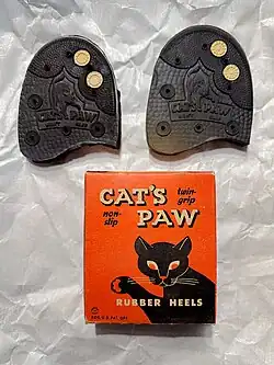 A deadstock sample of Cat's Paw packaging and heels produced under the Cat's Paw Rubber Company.