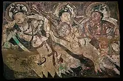 Cave of the Statues, back room mural, over a reclining statue of the Parinirvana Buddha.[131]