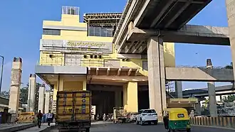 Station signage being installed in November 2024