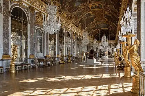 Baroque – Hall of Mirrors of the Palace of Versailles, by Jules Hardouin-Mansart, 1678–1684[34]