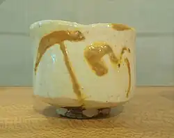 White tea cup (chawan) with brush decoration, glazed terracotta. 20th century. Georges Labit Museum.