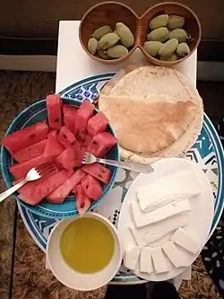 Watermelon is traditionally served with Akkawi or Nabulsi as table cheeses[8]