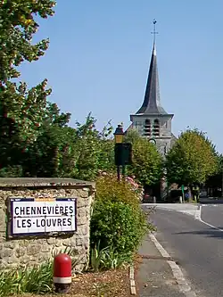 The Rue de Louvres, with a view of the church in Chennevières-lès-Louvres
