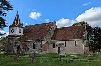 The C12 church of St. Mary The Less, at Chilbolton, Hampshire, England. September 2024.