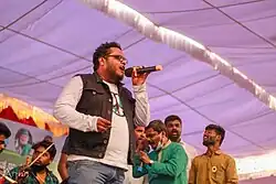 Vikas, performing on stage in 2021