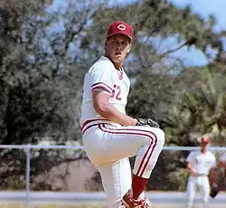 A baseball player in white