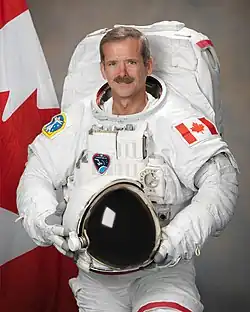 Canadian Space Agency astronaut Chris Hadfield, attired in a training version of his Extravehicular Mobility Unit (EMU) spacesuit.