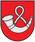 A coat of arms depicting a rounded, silver horn hung up by a rounded, silver strap all on a solid red background bordered by a black line