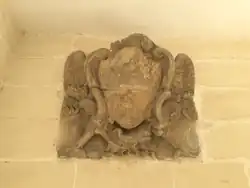 Defaced coat of arms (probably of Emmanuel de Rohan-Polduc) in Santa Venera, Malta