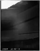 Detail of lower chord passing through double Burr Arch rings, viewed from below bridge (Note kerfs in arches)