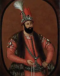 A color portrait of Nader Shah wearing his crown and royal dress
