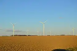 Fields and a wind farm just east of Convoy