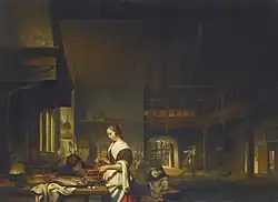 Kitchen interior with a woman cooking and a boy blowing flames