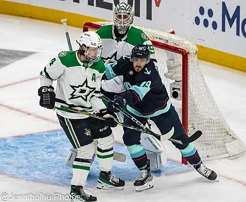 Dallas Stars at Seattle Kraken - May 13, 2023 - Round 2 Game 6 - Jake Oettinger, Jared McCann,.and Miro Heiskanen (52898955919).jpg