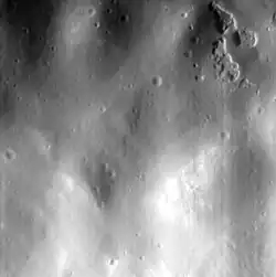 High-resolution image of one of the hollows (upper right) on the east side of the central peak. The image is about 2.8&nbsp;km wide.