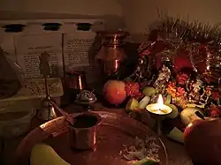 Food and a lit candle