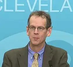 David Cole in a suit and tie