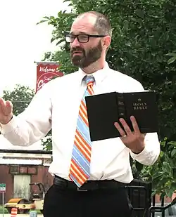 Picture of Freeman preaching in the street in downtown Cornelia, GA