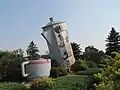 Coffee pot monument in Davidson, Saskatchewan. Approximately 24 feet tall, and would hold 150,000 cups of coffee — claimed to be the world's largest. Erected in 1996, and featured on a Canadian postage stamp in 2010, the town is now considering renovation of the monument.[13]
