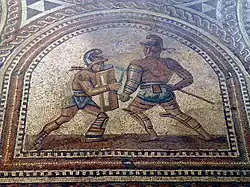 mosaic showing glasiators fighting
