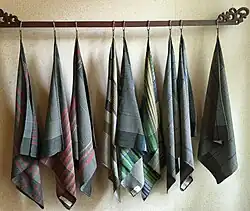 Dishcloths woven on the antique loom. Each cloth has a unique design, set by the weaver who completed the previous cloth.