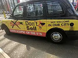 Black cab with Don't Sell The Sun messaging