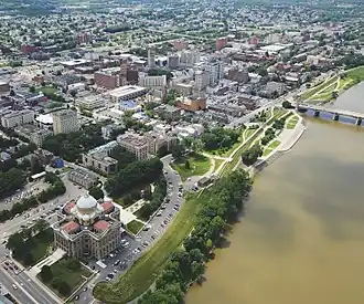 An aerial view of Wilkes-Barre and the Susquehanna River; the courthouse is visible in the foreground