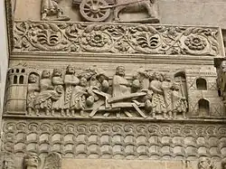 Bas reliefs on the west front: Saint Domninus saves a woman from a collapsed bridge