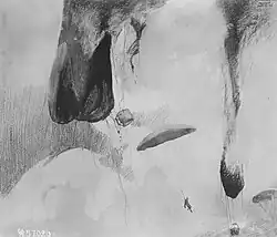 German plane shooting two Allied balloons